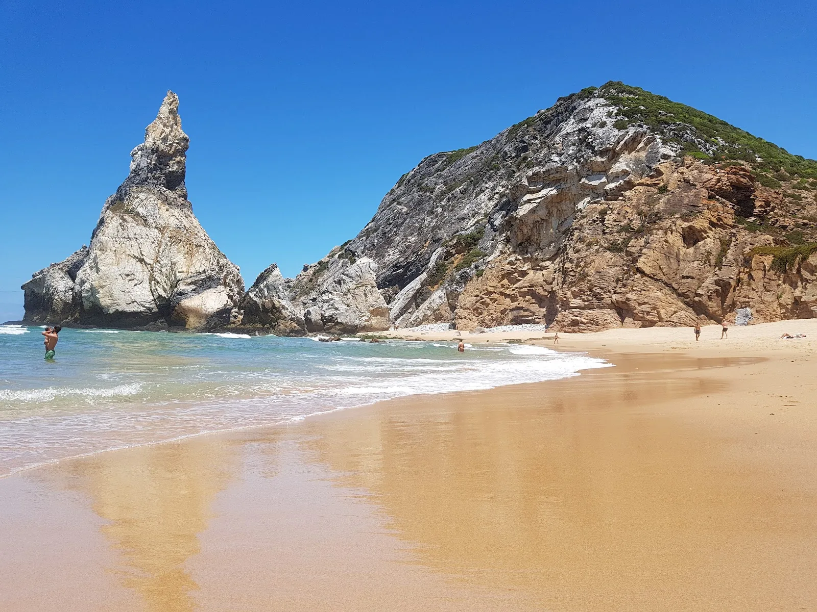 Sandy beach with rock formations in the Algarve